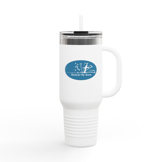 White travel mug with a blue logo on a white background from Sower To Sow