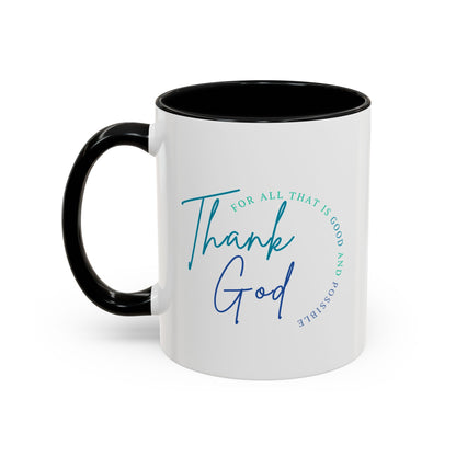 White mug with black handle featuring 'Thank God' text on a white background