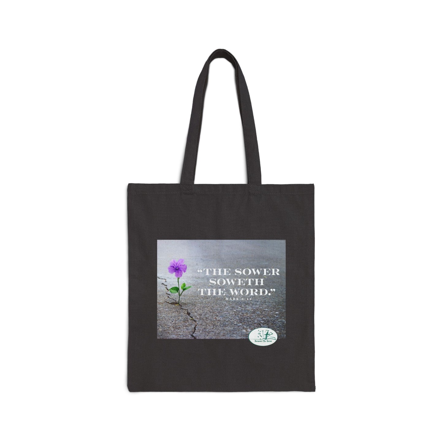 Black tote bag with a purple flower and text on a white background that says The Sower soweth the Word.