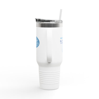 White tumbler with a straw on a white background