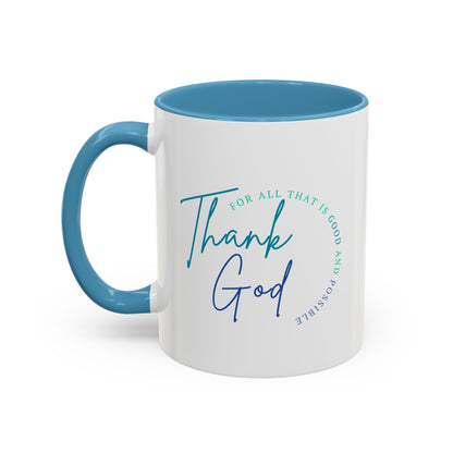 White mug with blue interior and handle, featuring 'Thank God' text on a white background