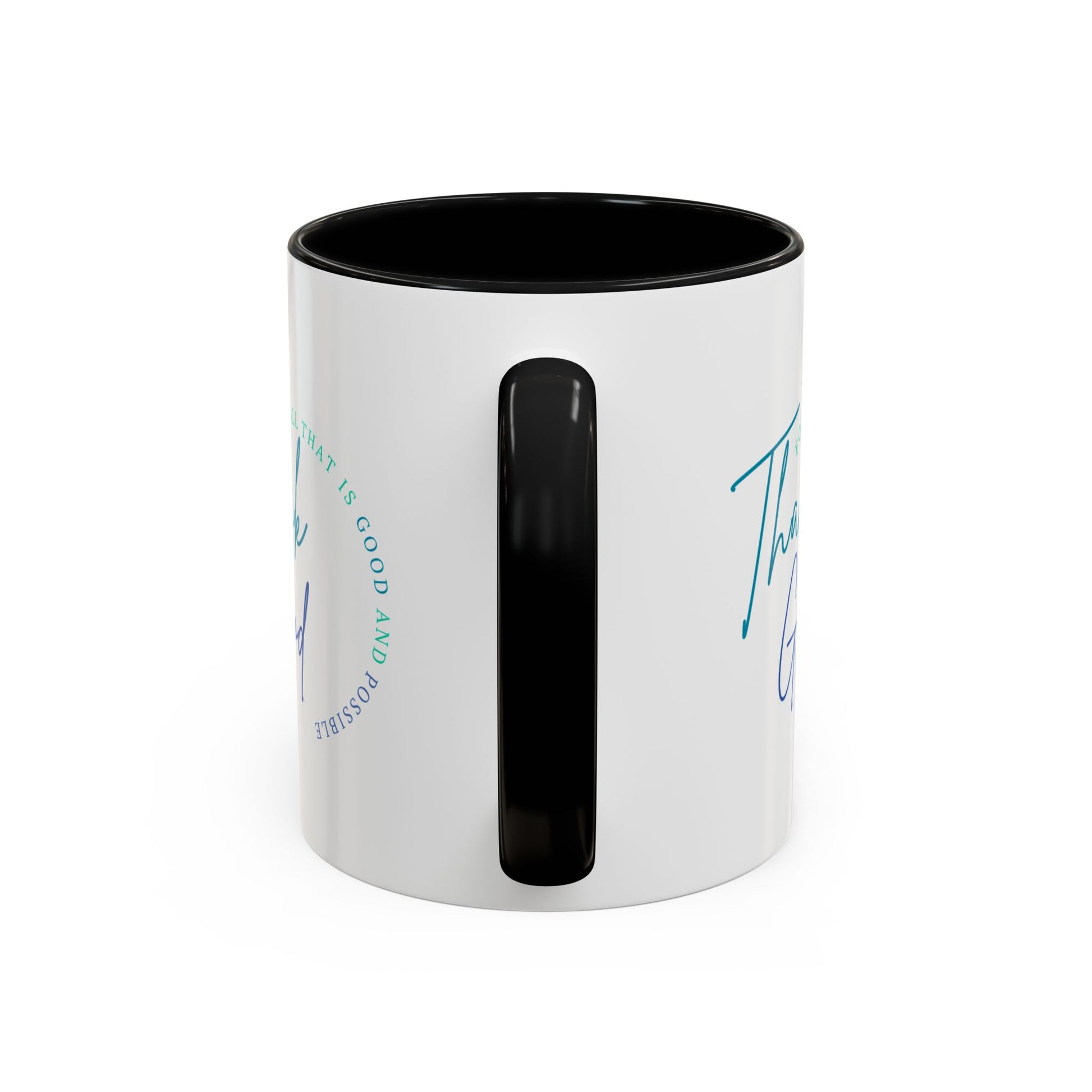 White mug with black interior and handle on a white background