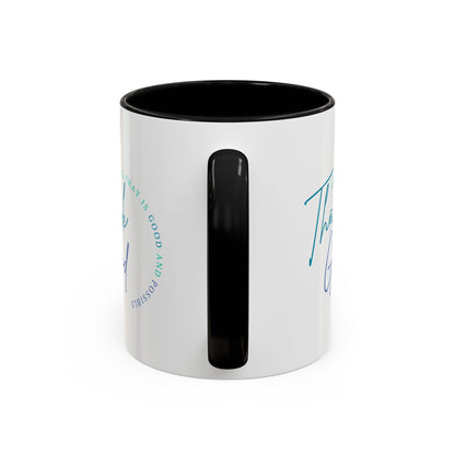 White mug with black interior and handle on a white background